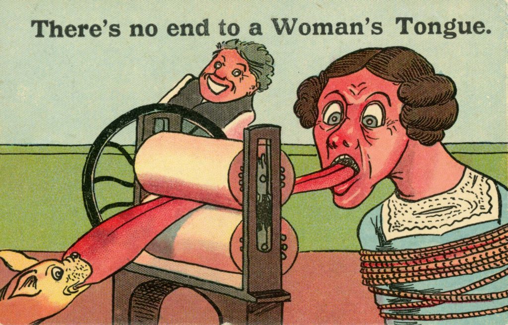 a caricature anti Suffragette postcard showing a woman's tongue being dragged through a mangle as a dog grabs it and a man laughs in the background