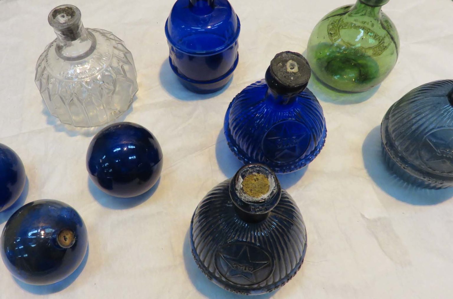 The beauty and danger in Victorian Glass Fire Grenades Museum Crush